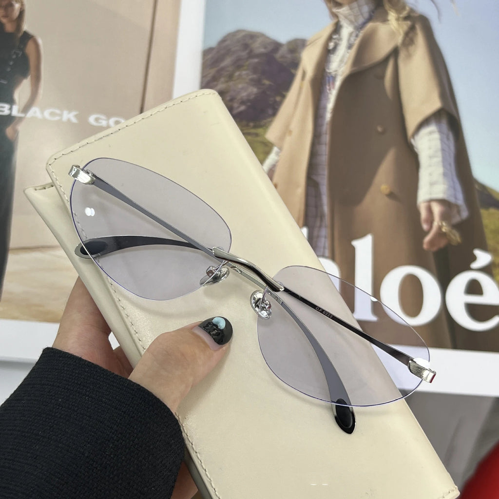 Korean Personalized Luxury frameless sunglasses Women Men High quality trending product Y2K futuristic hip-hop